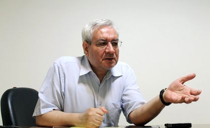 سلاح آمریکایی در دست یک فعال سیاسی اصلاحطلب+ عکس