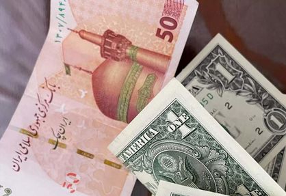 حذف دلار ارزش پول ملی را بالا نمیبرد