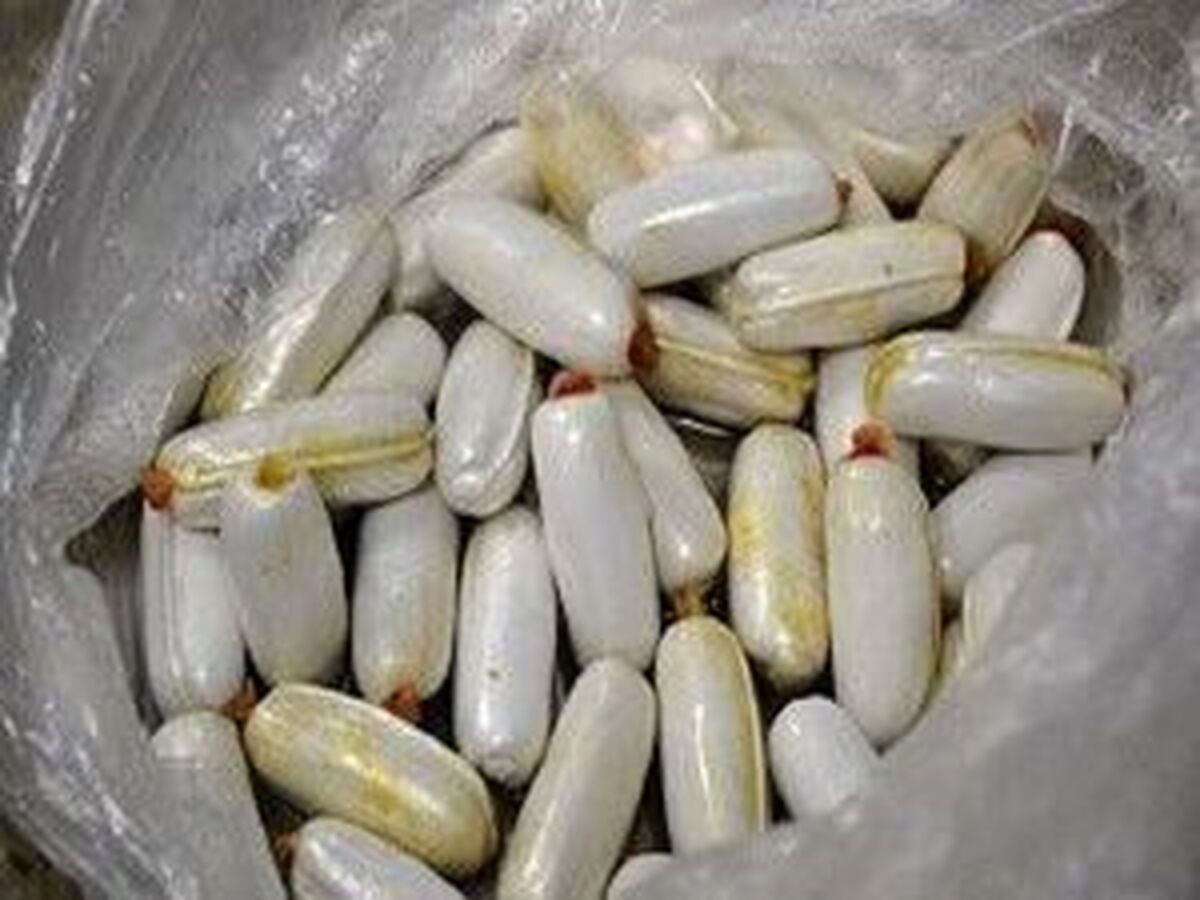 کشف جاساز ۲۰۰ بسته تریاک در معده ۲ نفر!