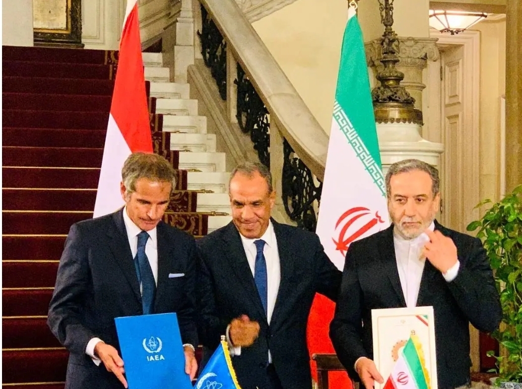 امضای توافق نامه از سرگیری مجدد همکاری بین ایران و آژانس